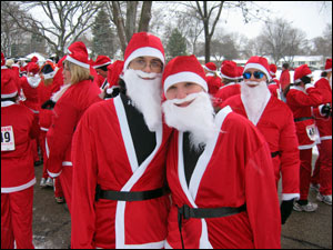 <image:Steven and Kim as Santa Runners;