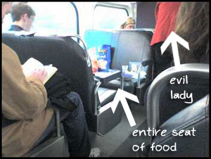 image:Lady takes up entire seat with FOOD