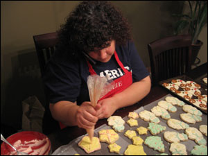 Mom frosting cookies