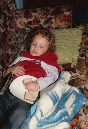 image:Young Kim asleep with PB sandwich in her hand