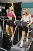 image:Two women working out in gym